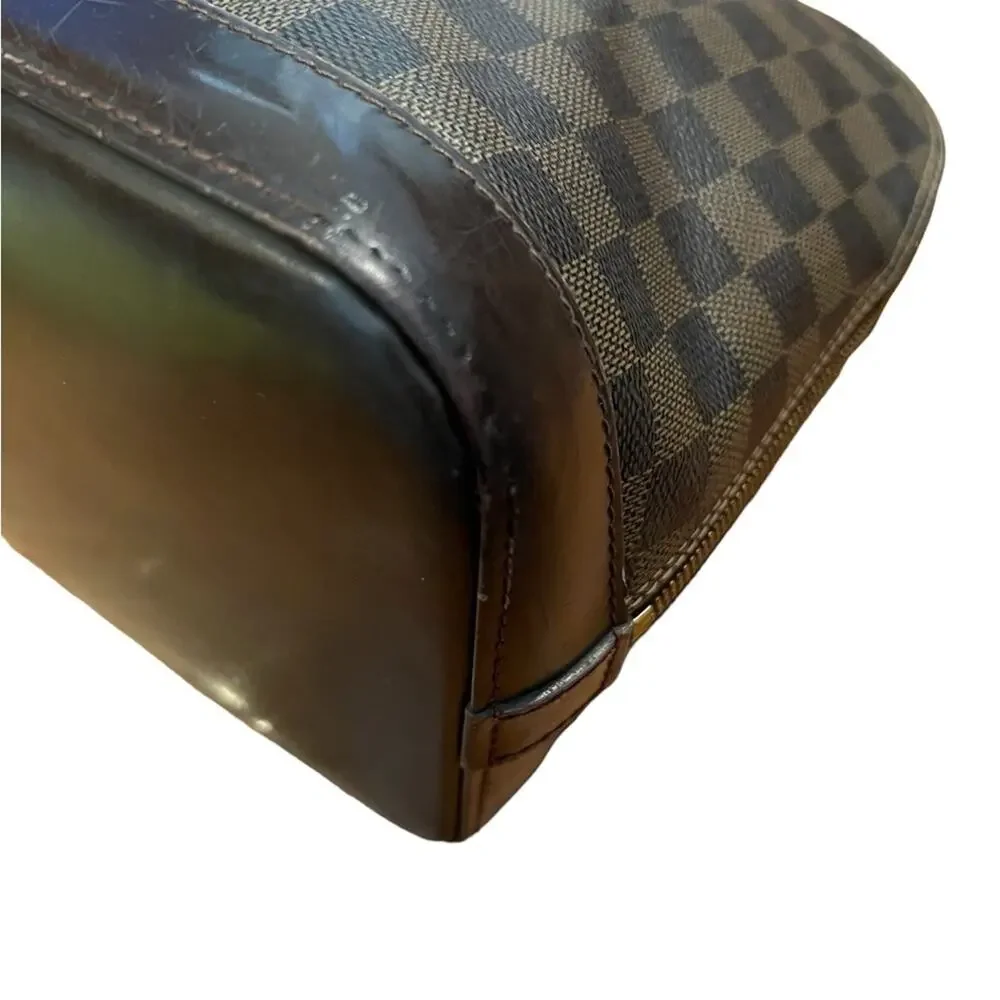 Louis Vuitton Damier Ebene Alma Handbag